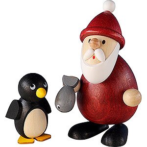 Kleine Figuren & Miniaturen Weihnachtsmann Weihnachtsmann mit Fisch und Pinguin - 9,5 cm