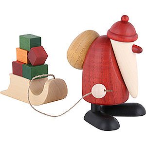 Kleine Figuren & Miniaturen Björn Köhler Weihnachtsmänner kl. Weihnachtsmann mit Geschenkeschlitten - 9 cm