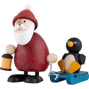 Kleine Figuren & Miniaturen Weihnachtsmann Weihnachtsmann mit Schlitten und Pinguin - 9,5 cm