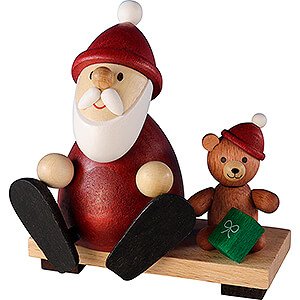 Kleine Figuren & Miniaturen Weihnachtsmann Weihnachtsmann mit Teddy auf Bank  - 8,5 cm