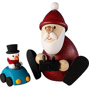 Kleine Figuren & Miniaturen Weihnachtsmann Weihnachtsmann mit ferngesteuertem Auto  - 8,3 cm