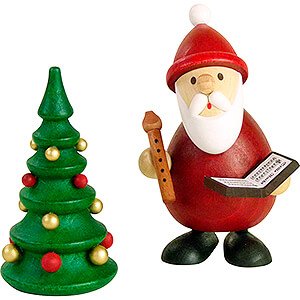 Kleine Figuren & Miniaturen Weihnachtsmann Weihnachtsmann singend mit Notenbuch, Flte und Weihnachtsbaum  - 9,5 cm