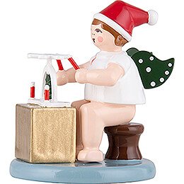 Christmas Angel sitting with Hat and Pyramid - 6,5 cm / 2.6 inch