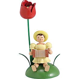 Blumenkind mit Tulpe und Harmonika sitzend - 12 cm