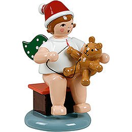 Weihnachtsengel sitzend mit Mtze und Teddy - 6,5 cm