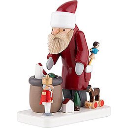 Weihnachtsmann mit Spielzeug  -  7,5cm